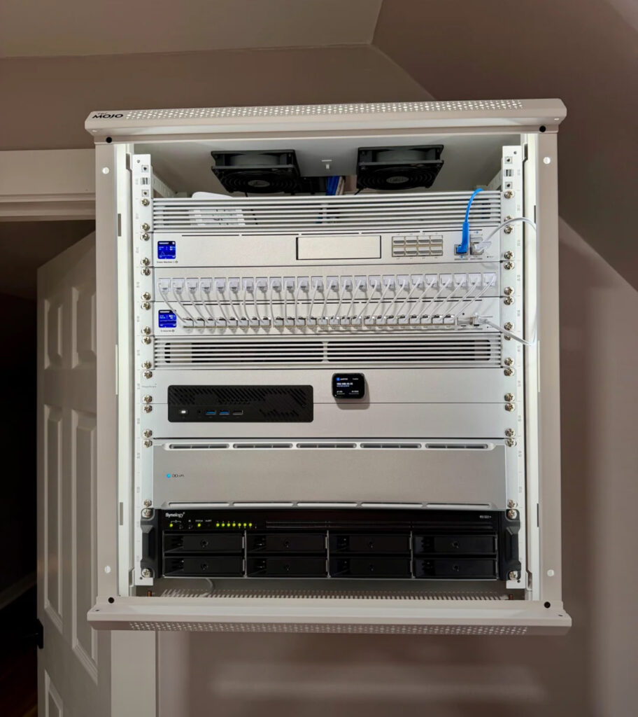 Network rack with camera and green led lighting on wall